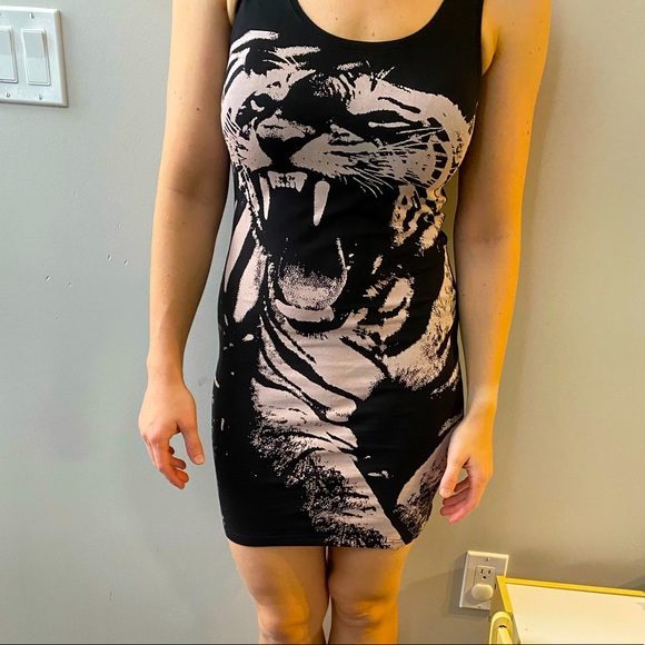 H&M Dresses & Skirts - 9/$50- Tiger short summer dress for going out